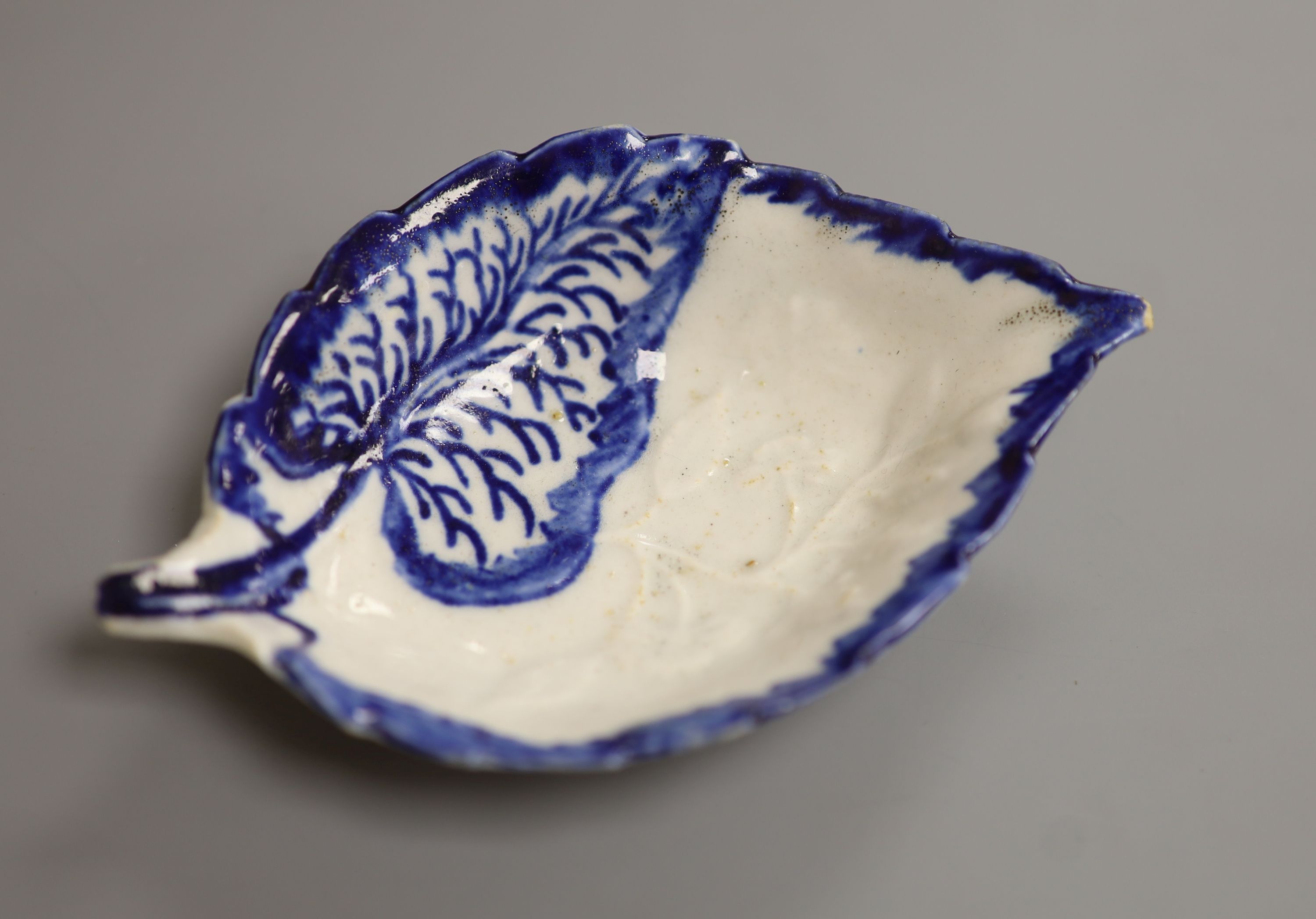 A Liverpool shape pickle dish, with leaves and flowers, c.1765, length 11.5cm